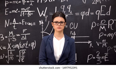 Serious Woman Physicist Completing Complex Theorem And Carried Out Calculations