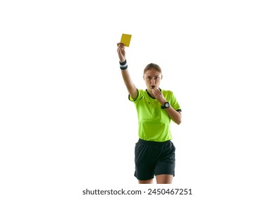 Serious woman, soccer referee gesturing, raising hand, stopping game and showing yellow card as warning against white studio background. Concept of sport, competition, match, profession, football game - Powered by Shutterstock