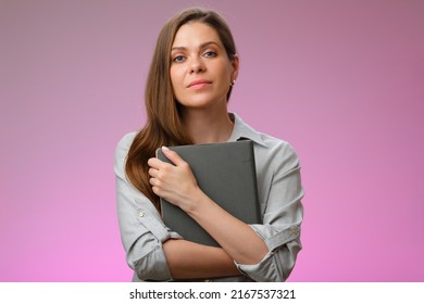 Serious woman teacher or student girl holding book in front of, isolated female portrait.