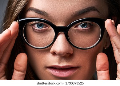 Serious Woman Wearing Black Frame Glasses