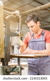 Serious Woodworker Cutting Holes Through Steel Plank