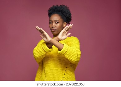 Serious young african american woman show stop finish gesture by crossed hands, protest against racial discrimination - Shutterstock ID 2093821363