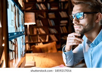 Serious young businessman wearing glasses looking at pc computer screen working online by video conference call having remote social distance online team virtual chat meeting concept, close up view.