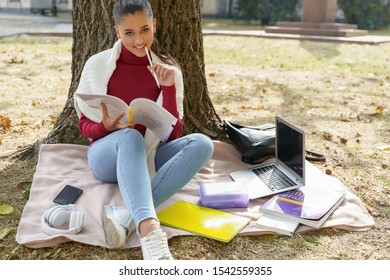 Serious Young Lady Deciding Which Topic To Choose For Her Essay