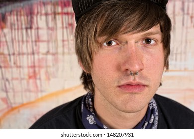 Serious Young Male Teen With Nose Ring