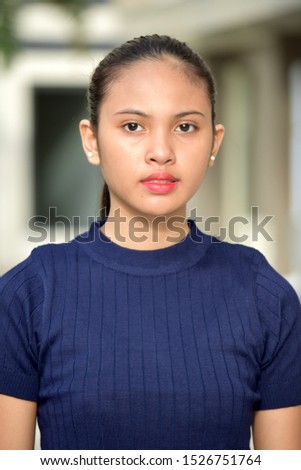 A Serious Youthful Asian Person
