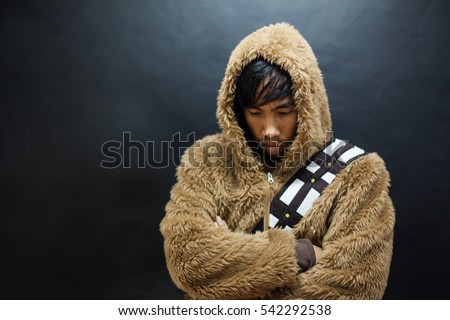 Seriously, Funny Eskimo Man cross one's arm in Vintage Style Look Portrait.