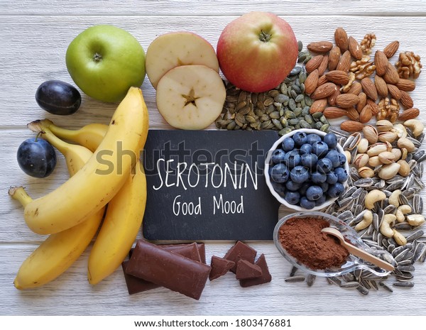 Serotonin-boosting foods. Assortment of food for\
good mood, happiness, better memory, and positive mind. Healthful\
foods that may help boost serotonin. Natural sources of serotonin,\
healthy\
diet.