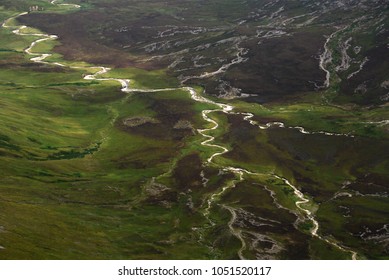 Serpentine River Flowing Between The Twelve Bens In Connemara