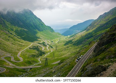 Serpentine Of Transfagarasan Road In Mountains Of Romania. Gorgeous Travel Destination In Dramatic Weathe