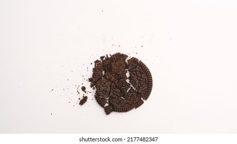 Serpong, Indonesia - July 08 2022: Oreo Cookies With Crumbs On White Background. Is A Chocolate Sandwich Cake With Sweet Vanilla Cream Is The Best-selling Snack In Indonesia.