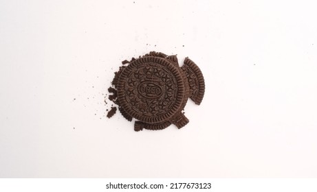 Serpong, Indonesia - July 08 2022: Oreo Cookies With Crumbs On White Background. Is A Chocolate Sandwich Cake With Sweet Vanilla Cream Is The Best-selling Snack In Indonesia.