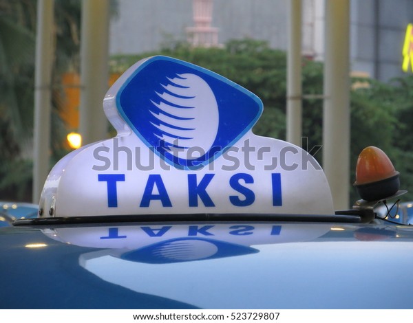 Serpong, Indonesia -November 27, 2016: Taxi\
light on meaning it is available to be\
hired.
