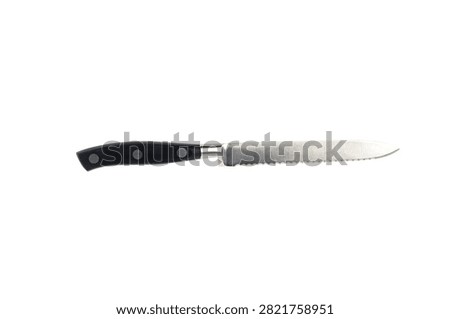 A serrated bread knife with a black handle.