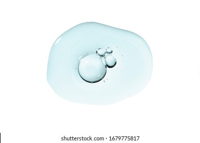 Serum smear smudge swatch with collagen and peptides. Skin care gel transparent sample blue drop with bubble isolated on white background. Emulsion texture. Anti aging woman beauty cosmetic product.