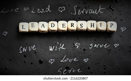 Servant leadership letters on black background
