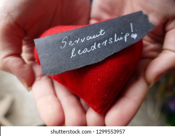 Servant Leadership - Open Hands With Red Heart And Note 