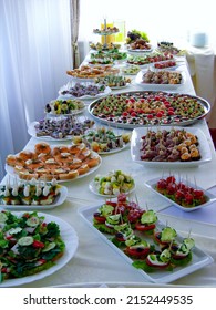 Served For A Banquet Table. Banquet Table Images. Long Dinner Tables Covered With White Cloth. 