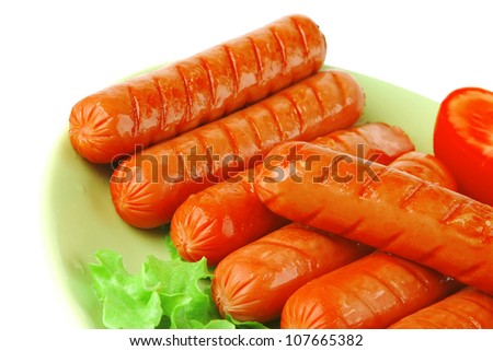 served beef roasted sausages on light dish