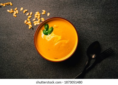 Served Creamy Bright Orange Butternut Squash Soup. Creamed Blended Yellow And Orange Vegetables, Rich In Carotene.Pumpkin Seeds.Delicious Homemade Diet Meal.Thick Pumpkin Purée Recipe