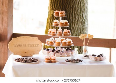 Served Festive Candy Bar Table With Cupcakes Tower