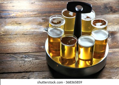 served Koelsch (specialty beer from Cologne) in a typical tray on wooden background