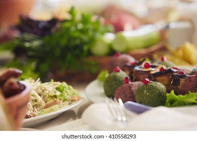 Served table with different meals.