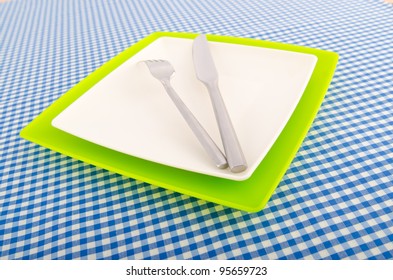 Served table with fork and knife