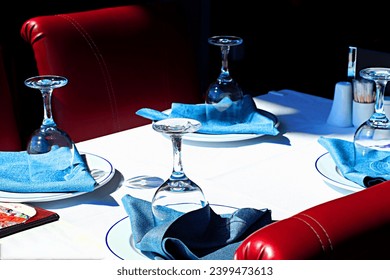 Served table on the open veranda of the restaurant