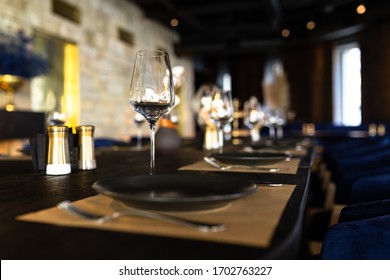 The Served Table In The Restaurant. Dark Wooden Table, Rustic. 