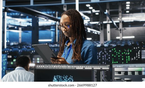 Server farm engineering team using AI algorithms and node tree systems to categorize unstructured data. Data center IT experts use visual programming and natural language processing software, camera B