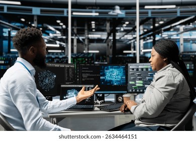Server farm teamworking colleagues using AI algorithms categorizing and clustering unstructured data. Data center engineering team using Natural Language Processing tech to analyze information