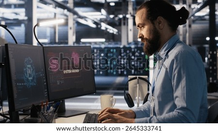 Server farm worker trying to fix hacked equipment systems and protect equipment. Data center engineer reacting to virus popup warning on computer screen, launching emergency response protocol