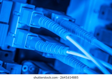 server with fiber optic  cables in data center