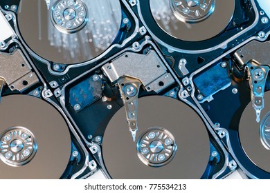 Server hard disks, illuminated optical fiber with blurred lights.
