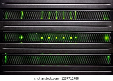 Server hard drives. Internet server in data center close-up view. Hard drives in a server rack