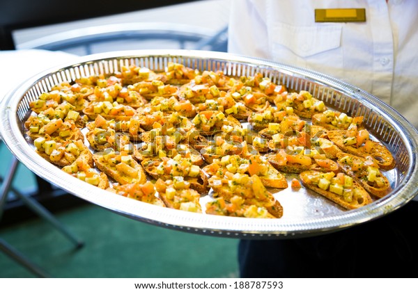 Server Holding Appetizer Platter Wedding Reception Stock Photo