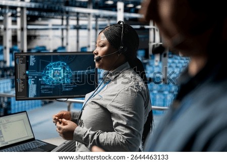 Server hub engineers diagnosing hardware failures using neural networks tech, guiding users. Teamworking employees using AI insights during voice calls in data center, resolving clients issues