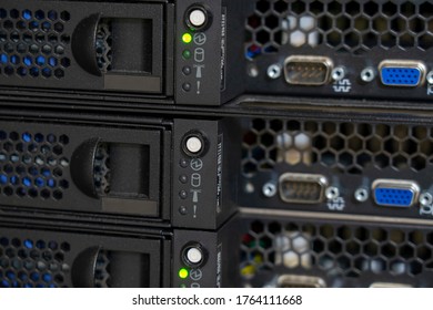 Server internet datacenter room, network, technology concept. Server rack cluster in a data center. Close up.