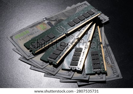 Server memory modules on US dollar bills. Workstation memory and DDR RAM cost. Memory upgrade concept with money. DDR server memory and expenses. Concept with RAM and cash.
