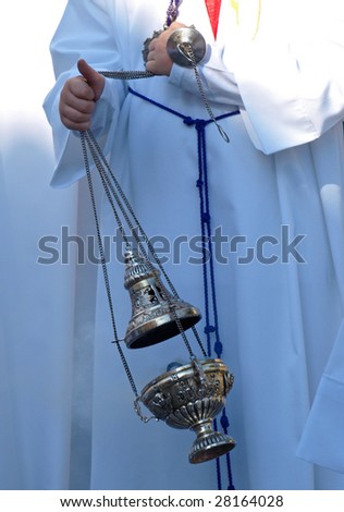 server moving the incense barrel