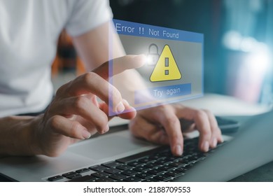 Server Not Found Error Danger Caution Warning Concept. 404 Error Page Not Found. Businessman using computer laptop with triangle caution warning sing for notification error and maintenance. virus.