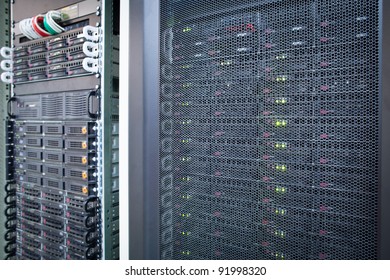 Server rack cluster in a data center (shallow DOF; color toned image)
