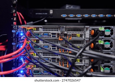 Server rack with network cables and blinking status lights in a modern data center environment - Powered by Shutterstock - Get 15% off with code: PIKWIZARD15