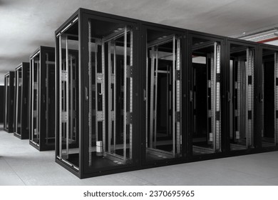 Server racks under construction in a data center hall. - Powered by Shutterstock - Get 15% off with code: PIKWIZARD15