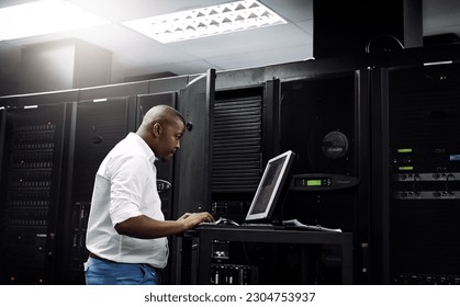 Server room, black man or coding on computer for programming or digital error in data center. Cybersecurity, support or technician typing online for fixing, troubleshooting or software development