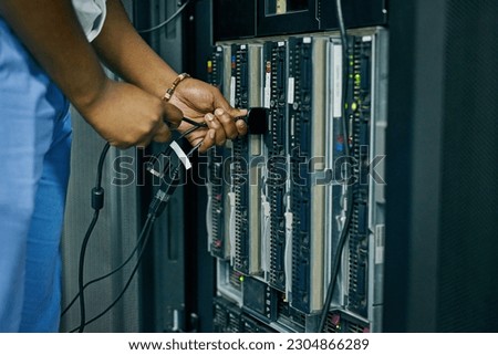 Server room, cables or hands of technician with hardware for online cybersecurity glitch or software solution. Closeup, man or hand of engineer fixing network for information technology or IT support