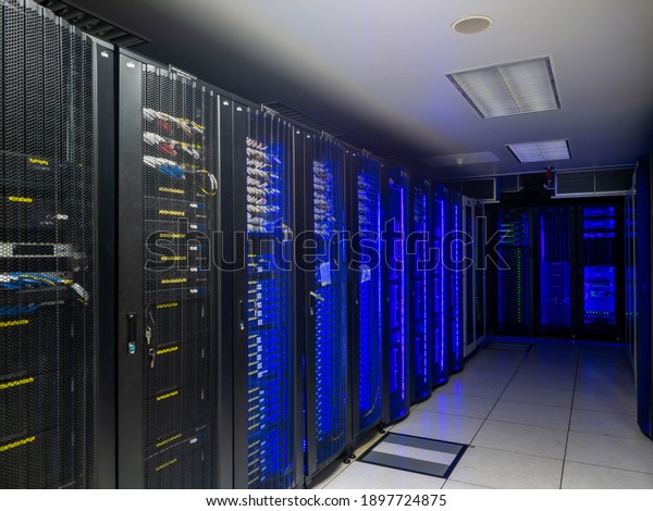 Server room data\
center. Backup, mining, hosting, mainframe, farm and computer rack\
with storage information