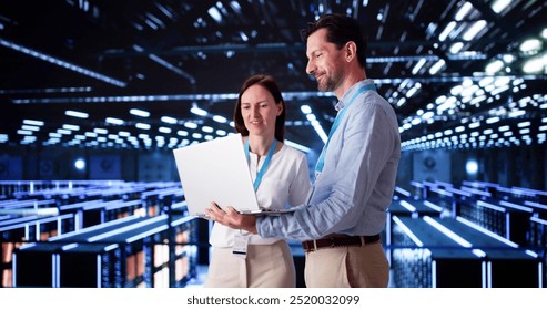 Server Room In Data Center. Cloud Computer Engineers Configuring AI Technology - Powered by Shutterstock