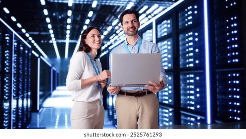 Server Room In Data Center. Cloud Computer Engineers Configuring AI Technology - Powered by Shutterstock